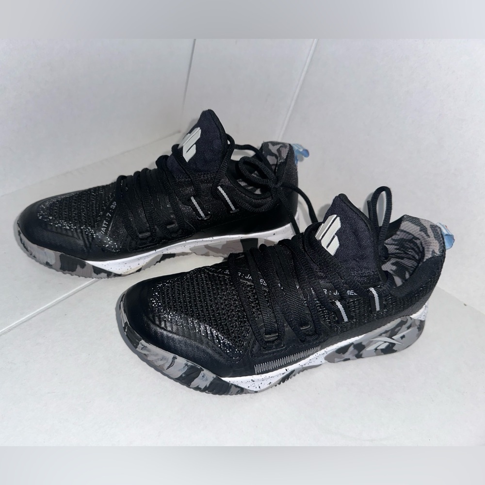 Reebok For boys or girls Black and White Sneakers size 4 1/2